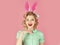 Retro woman in bunny ears, easter. Easter, makeup, pinup party, girl in rabbit ears. Vintage look. Sexy blond girl with