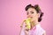 Retro woman eating banana. pinup girl with fashion hair. banana dieting. pin up woman with trendy makeup. pretty girl in