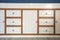 Retro wooden closet with drawers closeup, modern interior minimalist style wardrobe