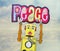 Retro yellow robot man holding up a bright and colorful cloth peace  sign