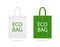 Reusable eco bag mockup. Ecology sack with white and green color. Fabric eco bags with handles. Handbag isolated icon for travel.