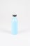 Reusable stylish eco friendly sustainable blue water bottle on light grey background