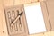 Reuse Note book with pen on a wooden