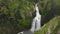 Reveal Fervenza do Toxa Cascades On Lush Valley In Quintas, Pontevedra Spain. Aerial Shot