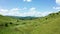 Revealing aerial drone shot of beautiful summer rural landscape