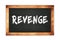 REVENGE text written on wooden frame school blackboard