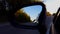 *Reverse Motion* Side View Mirror Driving Rural Country Street in Day.  Driver Point of View POV Rear Reflection Mirror