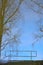 Reversed image of the river dommel, reflection of a bridge and trees