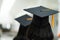 Review of the success university graduate hat during commencement. Concept of successful in education. University congratulation