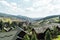 A review view of the resort city in the Carpathian mountains. Roofs of houses and mountains look very atmospheric