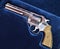 Revolver magnum 357 on blue velvet background