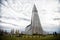 Reykjavik, Iceland - October 12, 2017: hallgrimskirkja church and people on cloudy sky. Christianity, religion and faith. Tall str