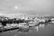 Reykjavik, Iceland - October 14, 2017: yachts at sea pier lights at dusk. Sailing boats at coast on evening sky. Water