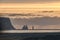 Reynisdrangar in morning sunrise at kirkjufjara beach viewpoint.Reynisfjara is a world-famous black-sand beach found on the South