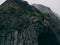 Reynisfjara black sand beach foggy basalt column hexagon stones