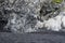 Reynisfjara Black Sand Beach shoreline with interesting rock formations, Iceland