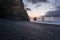 Reynisfjara, a volcanic black sand beach, in the background the rocks of Reynisdrangar, in Vik, Iceland