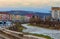 ReÈ™iÈ›a, Romania - March 29, 2021: The Nera River meanders in the center of Resita in the riverbed, surrounded by buildings and