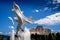 Rhapsody, a group of Fiberglass Dolphins, in a Fountain at Rhapsody Plaza in the city of Kelowna