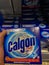 Rheinbach, Germany  14 October 2021,   A pack of Calgon Power Tabs in a customer`s hand in front of the shelf of a supermarket