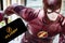 Rheinbach, Germany  19 October 2021,  The `The Flash` logo on the display of a smartphone in front of a scene from the series `The