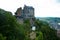 Rheinfels Castle between forests on a hill in the Middle Rhine Valley near Sankt Goar in Rhineland-Palatinate, Germany