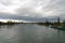 The Rhine river and an anchored container ship river barge near Strasbourg