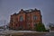 Rhinelander WI historic city hall building on a snowy day