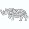 Rhino drawn with folk style ornaments on a white background for coloring, vector