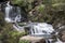 Rhiwargor Waterfall landscape in Snowdonia National Park during