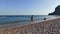 Rhodes, Greece: People doing leisure activity on a beach