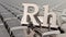 Rhodium ingots background with Rh symbol. 3D rendering