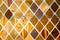 Rhombus background with different brown materials