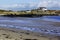 Rhosneigr beach, Anglesey, Wales. Winter scene. Waves break on the shore of the bay.