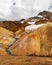 Rhyolite mountains in Iceland with snowfields