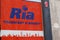 Ria Money Transfer sign logo and text brand windows Money Transfers agency service