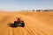 Riad, Saudi Arabia, February 15 2020: A quad stands on a sand dune in Saudi Arabia. Driving a quad in the dunes is a popular