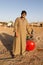 Riad, Saudi Arabia, February 15 2020: A young Saudi stands with his compressor on the side of the road