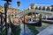 Rialto Bridge PONTE DI RIALTO and canal in Venice, typical architecture of Italy