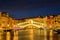 Rialto bridge Ponte di Rialto over Grand Canal at night in Venice, Italy