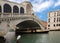 Rialto bridge in Venice with the vaporetto moving on the Grand C