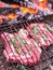 Rib eye steaks and grill with burning fire behind them.