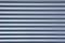 Ribbed metal blue background
