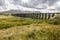 Ribblehead viaduct with views of the yorkshire moors and the three peaks