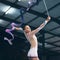 Ribbon gymnastics, woman and dancing in performance, training show and sports competition. Young female, rhythmic