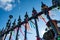 Ribbons of Bonfim souvenirs tied to the railing of the fountain at Largo Terreiro de Jesus in Pelourinho, the historic center of