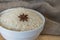 Rice in bowl with star anise. White rice close up