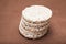 Rice dietary loaves laid out by a pyramid. Brown background