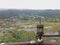 Rice fields and foggy small village view from high angle with beautiful lamp at the side