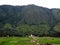 Rice fields in a low mountain valley and a small village in Pulau Samosir. Indonesia